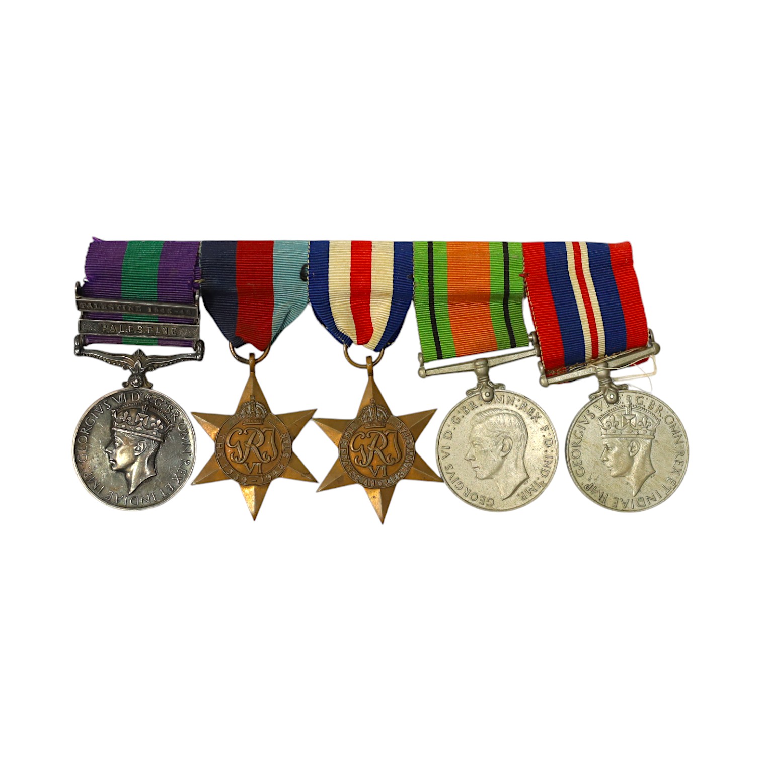 A WWII medal group awarded to Pte. J. Langridge S. Staff, comprising; a General Service Medal with two bars for Palestine and Palestine 1945-48, stamped to the edge with the recipient’s details, together with a 1939-45 S